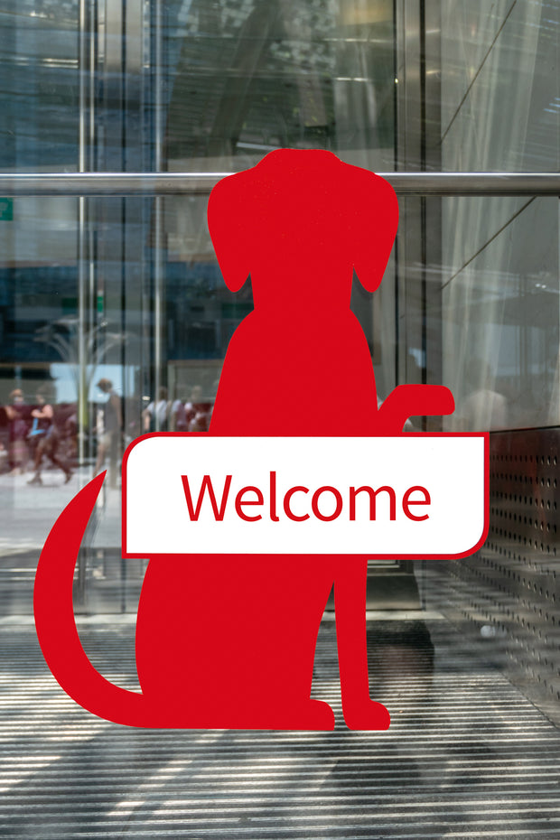 Red cutout of a dog with a "WELCOME" sign.